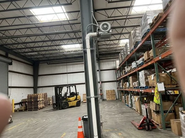 Warehouse radon system with suction pipe and regenerative blower